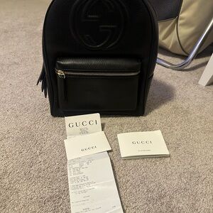 Gucci Black Leather Mini Backpack with Gold Zipper and Cream Interior